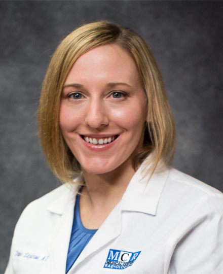 Frances lazarow, md professional headshot against a grey backdrop.
