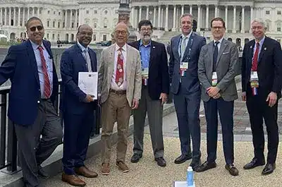 Mcr-and-evms-radiologists-attend-2024-acr-annual-meeting-img1 Group of radiologists from medical center radiologists and evms standing together outside the u. S. Capitol building during the 2024 acr annual meeting.